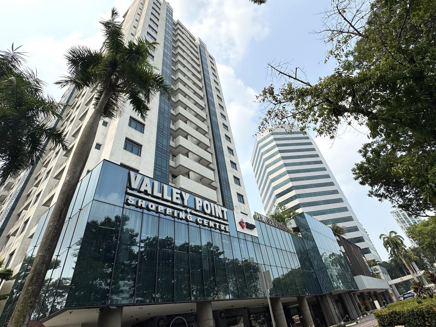 Existing Valley Point and Fraser Suites Singapore buildings at the River Opus redevelopment site, not a future project rendering